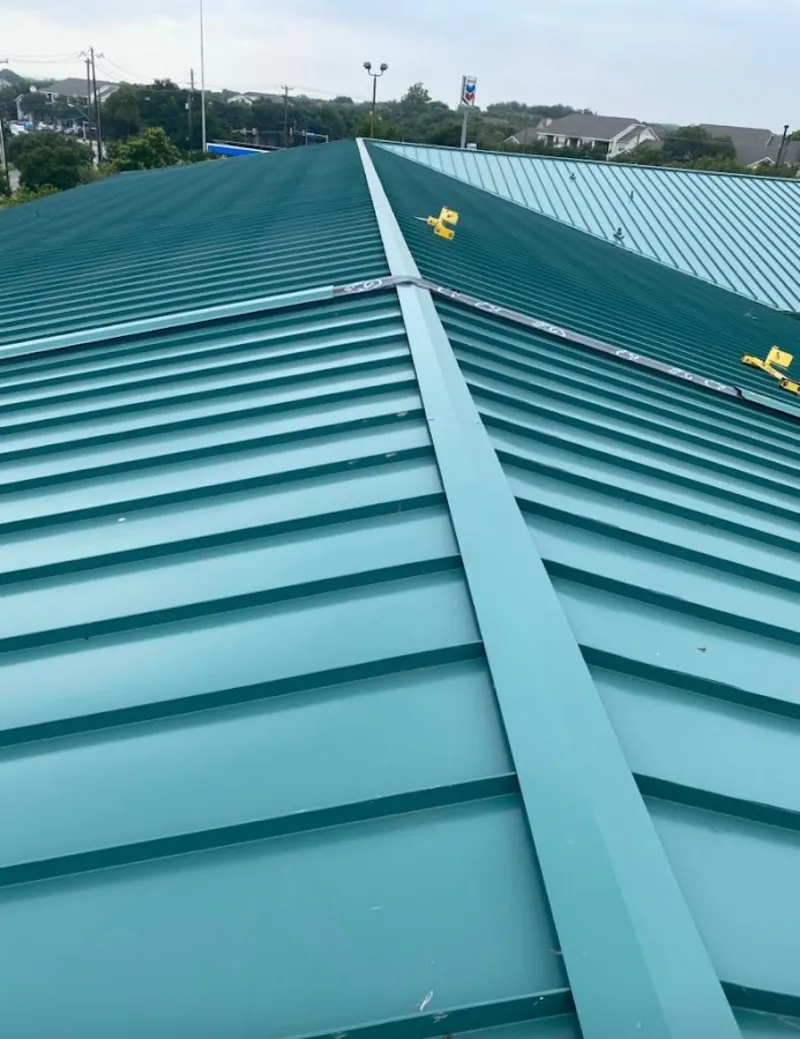 Green commercial metal roof ridge and valley for Metal Roof Repair in Chesapeake Beach